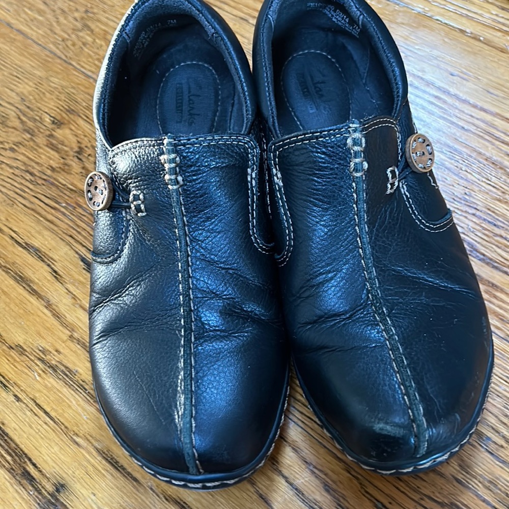 Clarks Unstructured slip on loafer.  Size 7.  Black leather uppers. Rubber soles